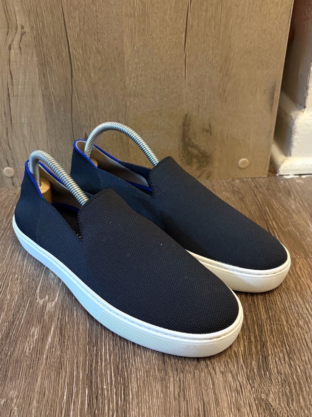 Women’s Black White with Blue Trim Rothy's The Original Slip On Sneakers